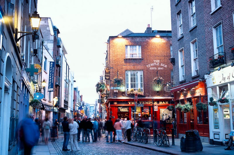 A street bustles in the Temple Bar neighborhood of Dublin